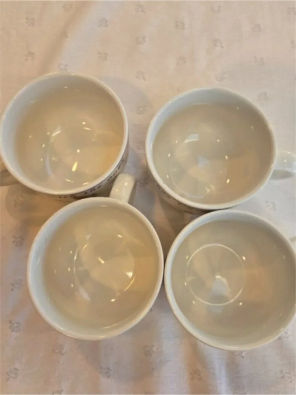 Set of 4 Holiday White Ceramic Mugs with Red Christmas Graphic